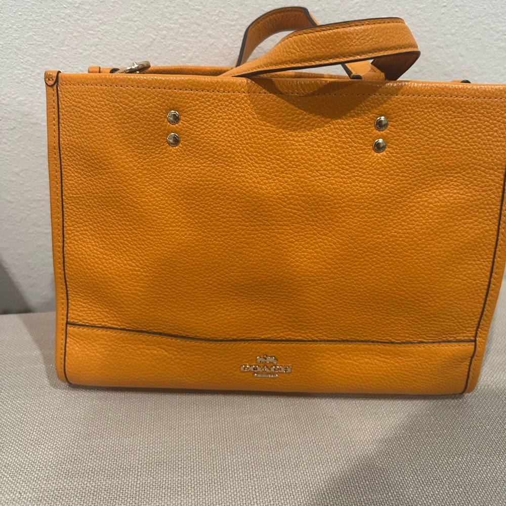 Coach Dempsey Sunbeam Orange Leather with coach charm